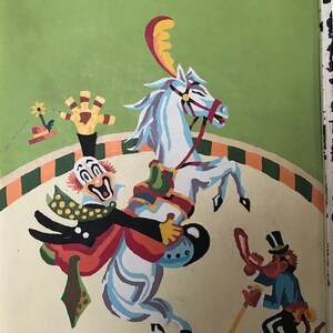 May include: A colorful painting of a clown riding a white horse in a circus ring. The clown is wearing a red, yellow, and green costume and has a big smile. The horse is wearing a red and yellow saddle and has a red bridle. There is a small figure of a monkey in the background.