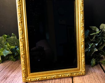 Espejo de adivinación dorado mediano