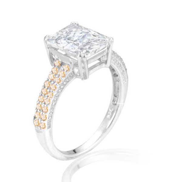 Sterling silver solitaire ring set with crystal white and champagne color
