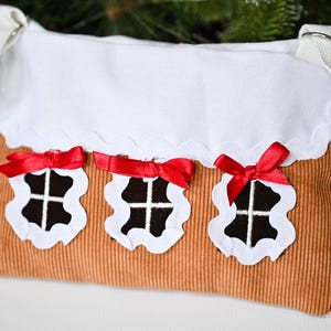 The back side of Gingerbread House Christmas Purse – Peppermint Candy Holiday Crossbody Bag.