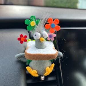 Car vent companion animal (soft sculpture)