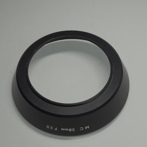 Minolta MC 28mm F2.5 lens hood
