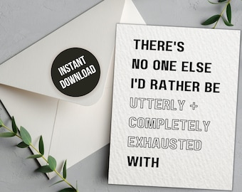May include: A white greeting card with the text "THERE'S NO ONE ELSE I'D RATHER BE UTTERLY + COMPLETELY EXHAUSTED WITH" sits next to a white envelope with a black "INSTANT DOWNLOAD" sticker. Green leaves are in the background.