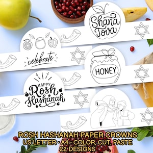 May include: Black and white paper crowns with Rosh Hashanah designs. The crowns feature illustrations of apples, honey, shofars, and the Star of David. Text includes "Shana Tova", "Honey", "Happy Rosh Hashanah", and "celebrate". The image also includes apples and pomegranates.