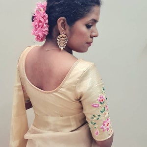 Gold Tissue Saree with Multicolor Embroidered Blouse