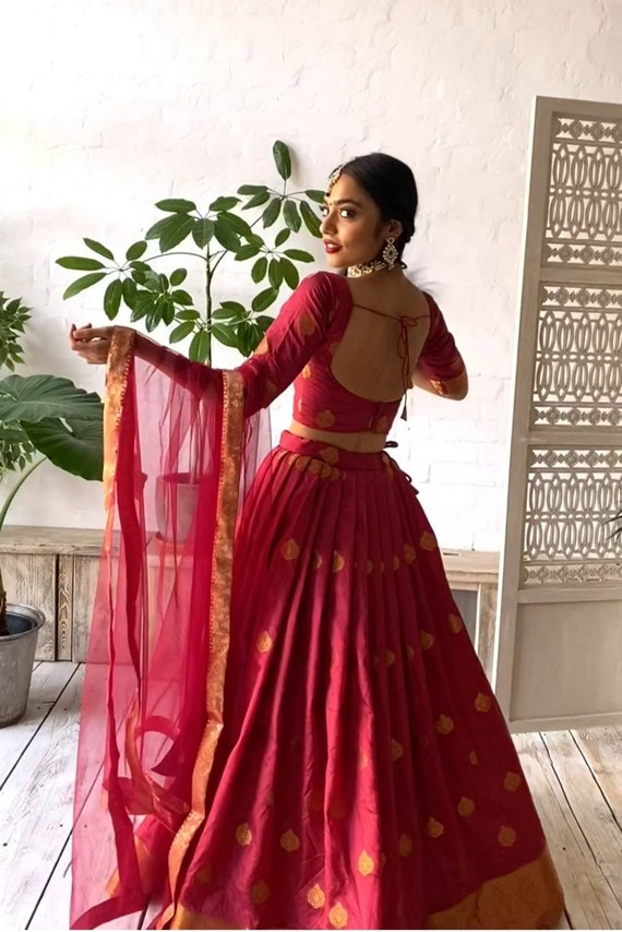 Tarun Tahiliani - Priyadarshini wears our red ombré zardozi lehenga and  matching blouse set with sequins, resham, and dabka work. It is offset with  a chiffon dupatta with embroidered borders and mukaish