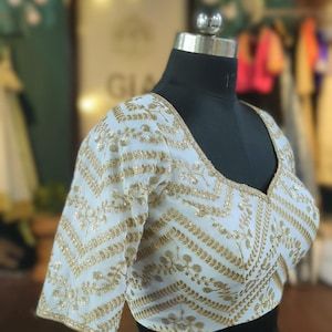 Ivory sequin floral blouse