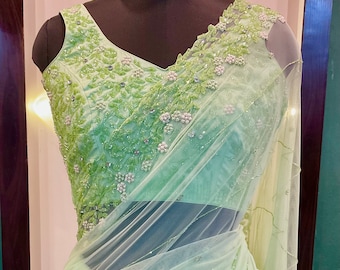 Hand Embroidered Light Green Net Saree with Silk Blouse