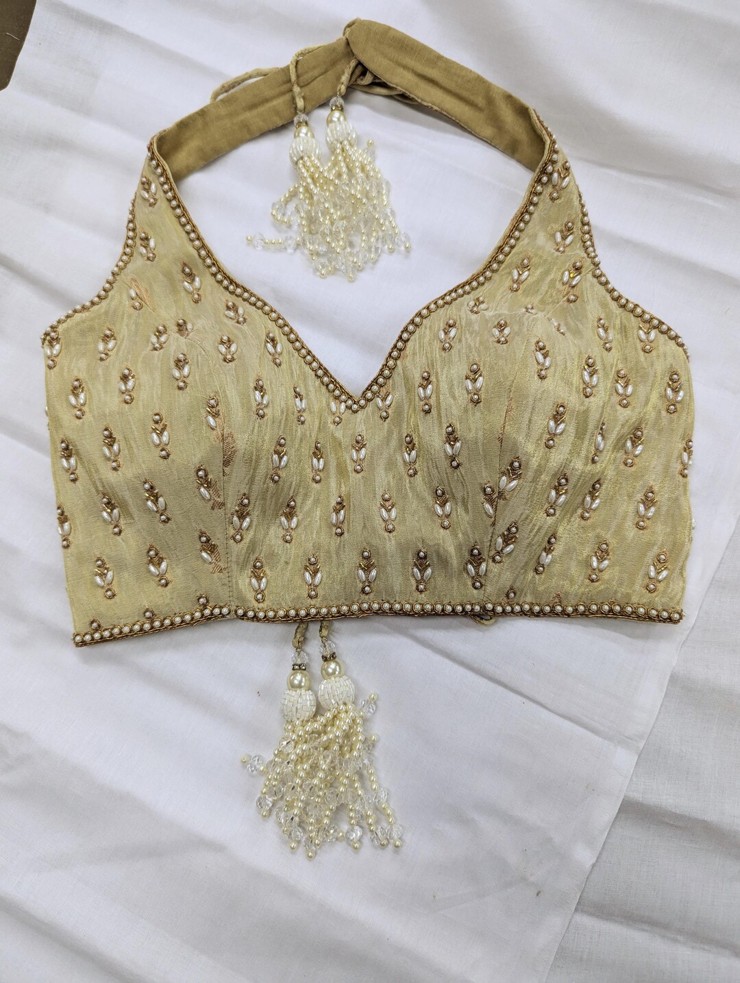 Olive Green Sleeveless Blouse with Deep U Neckline and Front Button Hook Closure