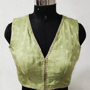 Pista green silk brocade sleeveless V neck blouse