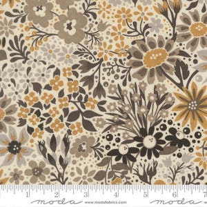 May include: Floral fabric with a cream background and a pattern of flowers in shades of brown, gray, and mustard yellow. The design includes various sizes and styles of flowers and leaves, creating a detailed and textured look. The fabric is marked with a ruler along the bottom.