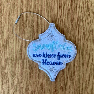 1086. Snowflakes are kisses from Heaven Christmas tree hanging decoration.