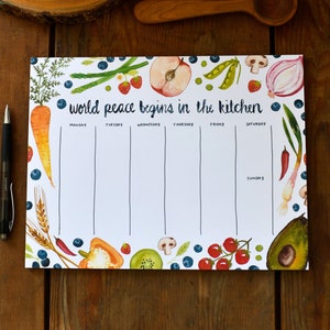 World Peace Begins In The Kitchen Meal Planner Notepad, 8.5 x 11 notepad made with recycled paper