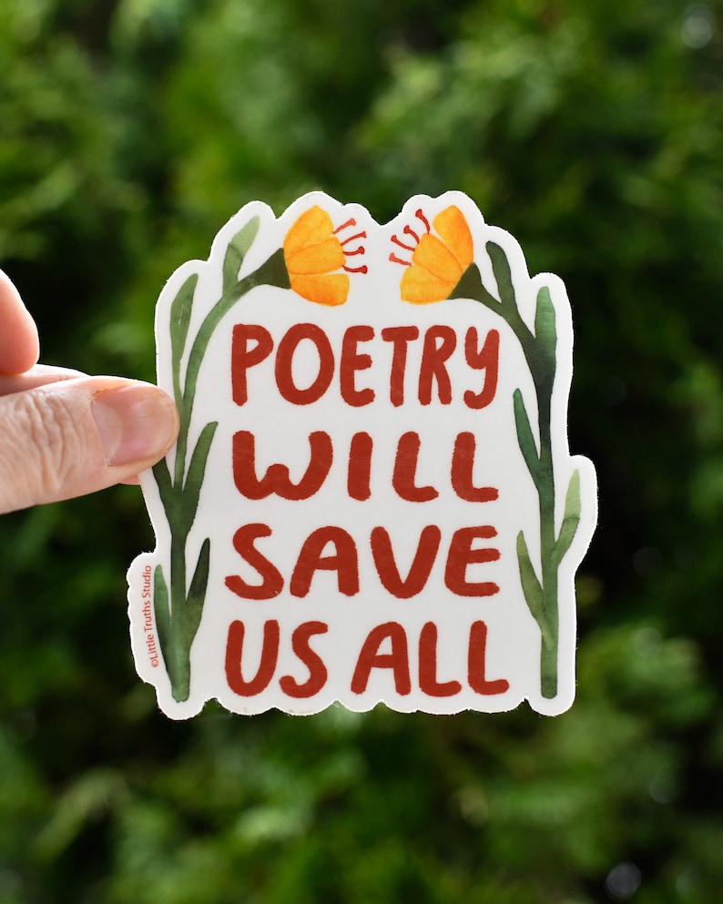 May include: A white sticker with a floral border and the text "Poetry will save us all" in red lettering. The flowers are yellow with green stems.
