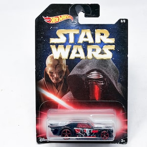 May include: A Hot Wheels Star Wars die-cast car in a black and red color scheme. The packaging features the Star Wars logo and images of Kylo Ren and Supreme Leader Snoke. The car is marked as 8/8 and includes the Disney logo.