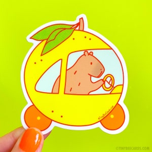 Capybara Driving a Yuzu Car Vinyl Sticker