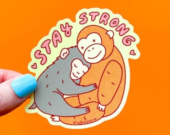 Baby Macaque Monkey with Stuffed Animal "Stay Strong" Punch Vinyl Sticker