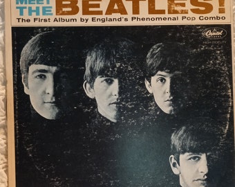 Meet The Beatles / The First Album by England's Phenomenal Pop Combo  / T-2047 Capital Records