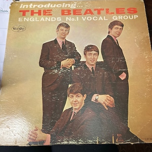 Introducing..The Beatles, England’s No.1 Vocal Group,  Vee Jay logo w/ colorband