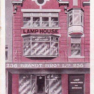 May include: Vintage postcard featuring a brick building with the text "LAMP HOUSE" and "236 BRANDT BROS LTD 236". The building has multiple windows and a storefront with lamps. Additional text includes "PITT STREET, SYDNEY."