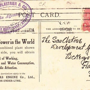 May include: Vintage postcard with text advertising "Cheapest Power in the World" from 1908. Features a stamp from New South Wales and a circular stamp from Arthur Leplastrier & Co. The postcard is aged with handwritten text.
