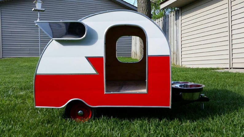 Vintage style doghouse trailer camper with wings
