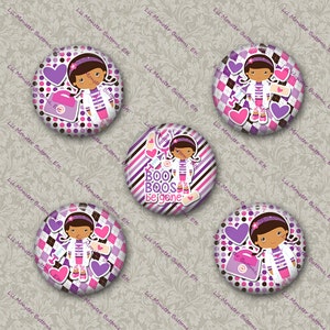 May include: A collection of five round buttons featuring a cartoon doctor in a white coat and pink accents. Some buttons have the text "BOO BOOS be gone". The buttons have a purple, pink, and white color scheme.