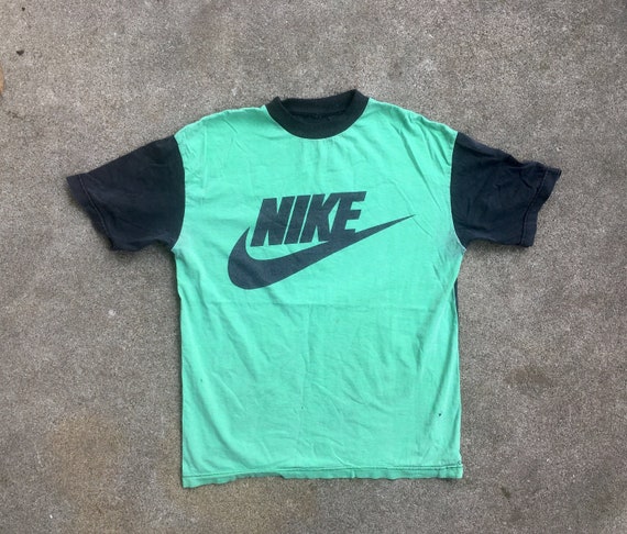 mint green nike shirt