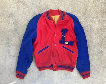 May include: A red and blue varsity jacket with a large blue "L" on the front. The jacket has a ribbed collar, cuffs, and waistband.