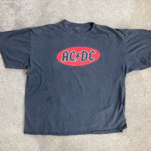 Vintage 1990s AC/DC Black Crewneck T-SHIRT Size Extra Large Hard Rock Concert Tour Band Stones Pink Floyd