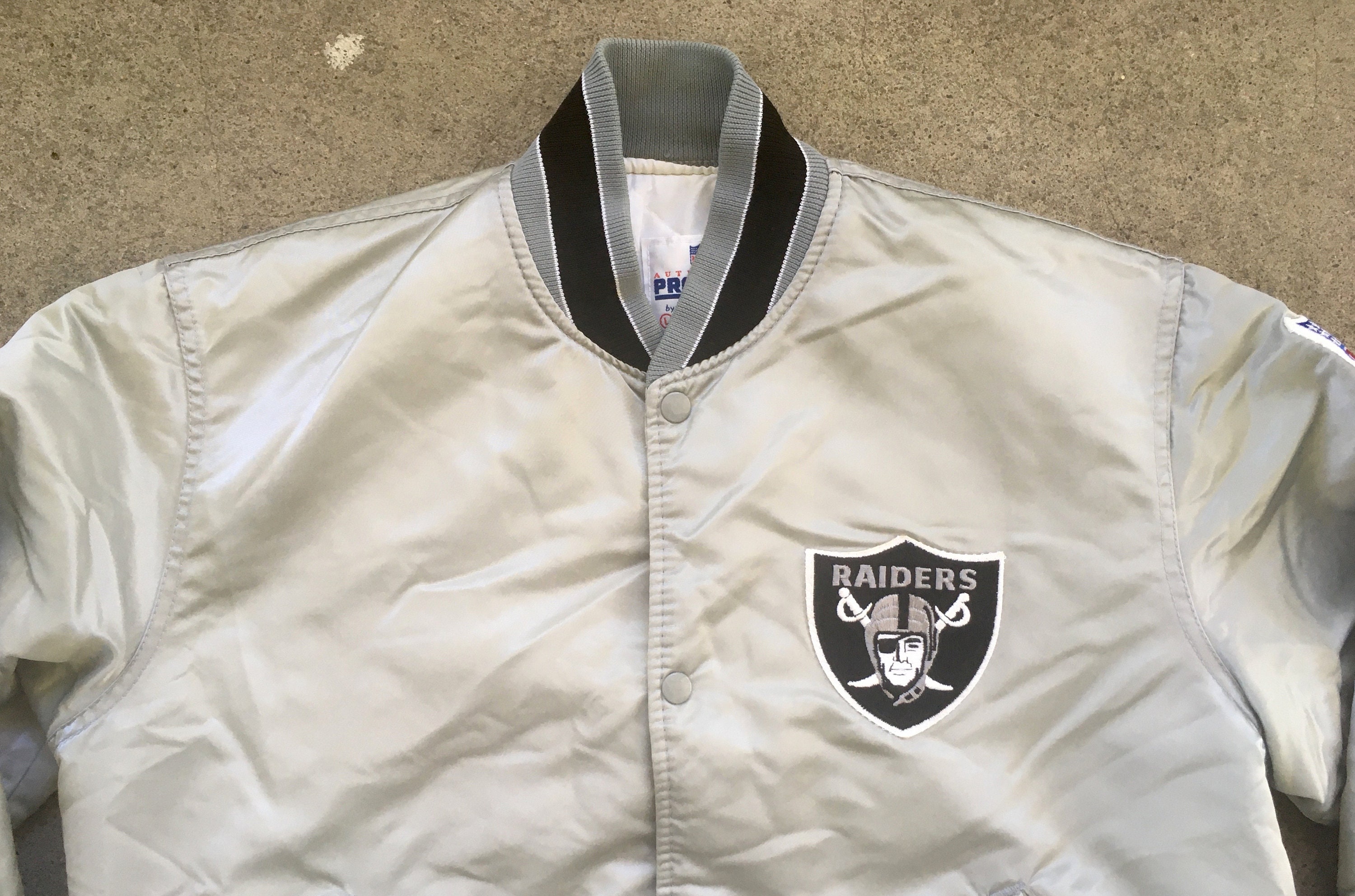 Vintage 1980s Oakland Raiders Starter Satin Black Jacket