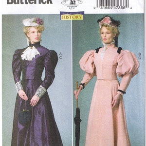 May include: A vintage sewing pattern for a long dress with puffed sleeves. The pattern is for sizes 6-16 and is from Butterick. The pattern is called "Making History" and has a barcode on the front.