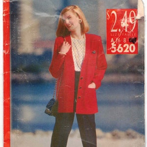 May include: A red blazer with a white polka dot blouse, black pants, and a black purse. The model is wearing a gold necklace and earrings. The image also includes the text "see & sew NOW" and "$2.49".