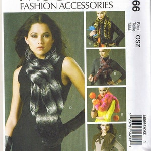 May include: A sewing pattern for five different scarf styles. The pattern is called McCall's Fashion Accessories and the pattern number is M6666. The pattern is for size OSZ.