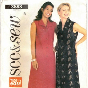 May include: A sewing pattern for a sleeveless dress with a button-up front and a collar. The pattern is for size 14, 16, and 18. The pattern is from the brand "See & Sew" and is labeled "Yes! It's easy."