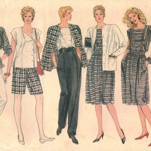 May include: A Vogue Patterns sewing pattern envelope, number 8617, featuring illustrations of five outfits including striped jackets, plaid shorts, high-waisted trousers, and dresses. The text Vogue Patterns and the number 8617 are clearly visible.