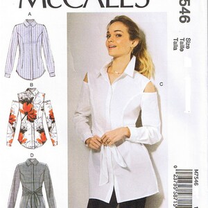 May include: McCall's M7546 sewing pattern featuring shirt designs. The pattern includes options for a collared shirt with shoulder cutouts, a striped shirt, a floral print shirt, and a belted shirt. The image shows a woman wearing a white shirt with shoulder cutouts.