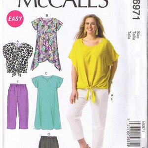 May include: McCall's sewing pattern M6971. The pattern includes options for tops, pants, and a dress. The cover features a woman wearing a yellow top tied at the waist and white pants. Other designs include a leopard print top and a purple dress.