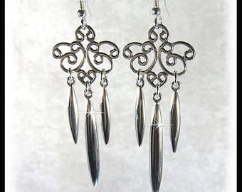 2221, Sterling Silver spikes dangle from a curly set of chandeliers, sterling silver earrings,  trendy earrings, silver earrings