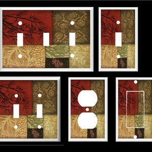 May include: Set of six decorative light switch and outlet covers featuring a patchwork design with pine cones, branches, and a red, green, and brown color scheme.