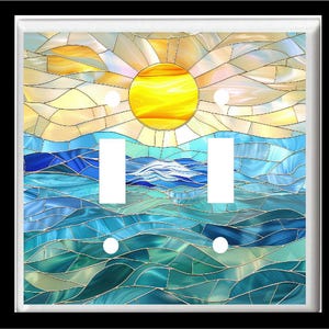 May include: A stained glass style light switch cover featuring a blue and green ocean scene with a yellow sun in the sky.