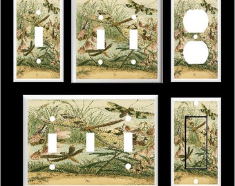 May include: Set of six light switch and outlet covers featuring a vintage illustration of dragonflies and water plants on a cream background.