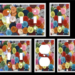 May include: Assortment of colorful button-shaped light switch and outlet covers. The covers feature a variety of colors and sizes of buttons.