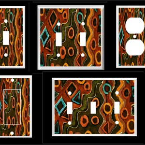 May include: Set of five light switch and outlet covers featuring an abstract geometric pattern in shades of brown, orange, green, and blue.