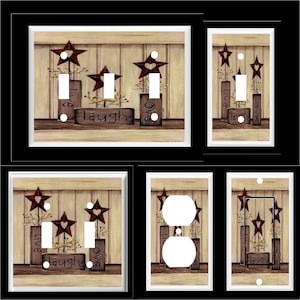 May include: Set of light switch and outlet covers featuring a rustic farmhouse design with red stars, wooden boxes, and the words "Live", "Laugh", and "Love".