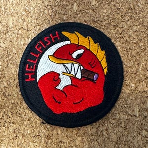 Toppa morale militare da 3" con pesce infernale volante di Abe Simpson infuriato