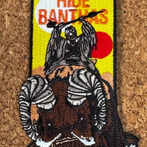 Los hombres reales montan Banthas Star Wars Parche Tusken Raider