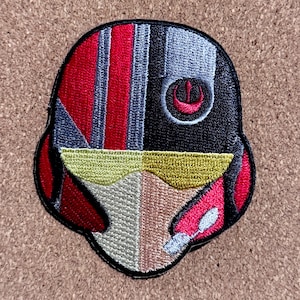 May include: A rustic wooden sign with the text "Welcome to our home" in white lettering. The sign has a distressed finish and a simple, inviting design, ideal for a hallway or porch.