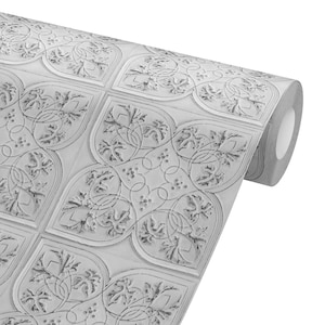 May include: A roll of white peel and stick wallpaper with a raised embossed pattern of a repeating quatrefoil design. The pattern is reminiscent of a traditional tin ceiling.