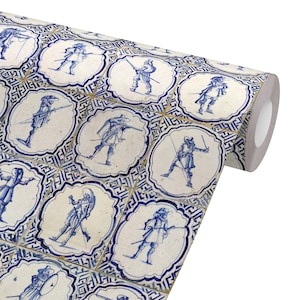 May include: Blue and white patterned wallpaper roll with a repeating design of figures in a circular frame. The figures are wearing hats and holding swords.